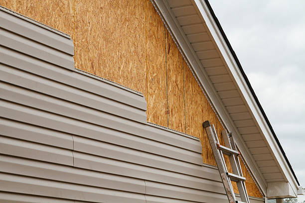 Professional Siding Replacement technician working in Boxford, MA